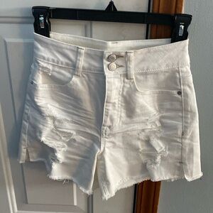 Adorable white jean shorts size 0 women’s, new condition, ✨style✨ rips in front